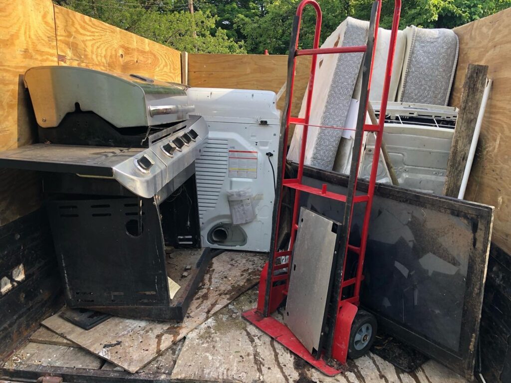 appliance removal loaded into a truck in washington dc