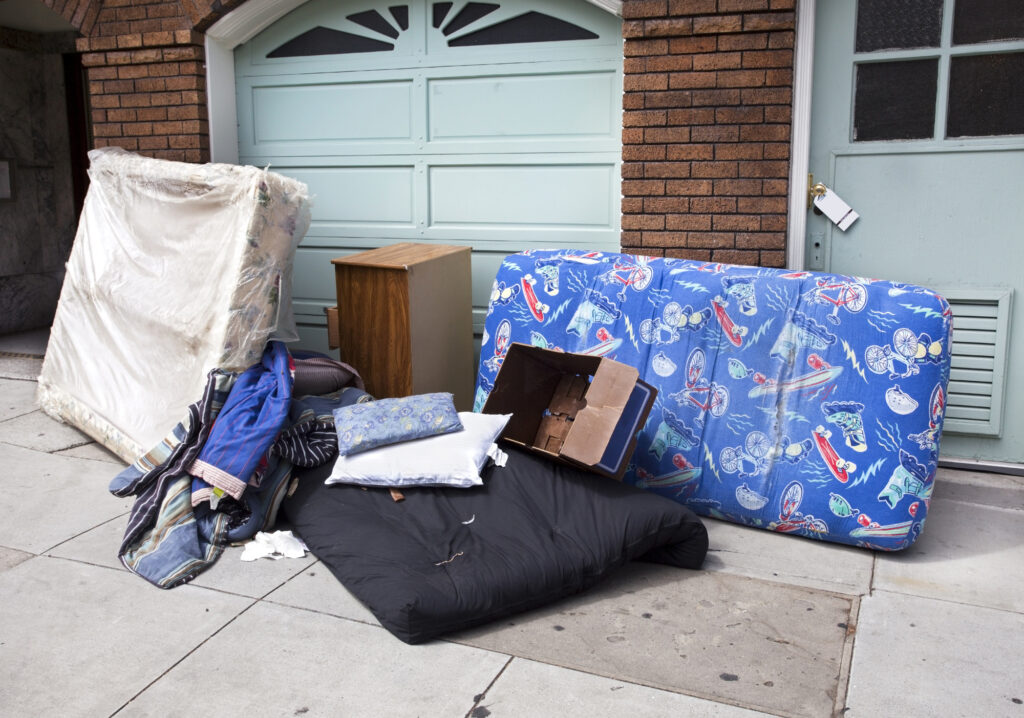 abandoned furniture ready for furniture removal outside of a home in washington dc